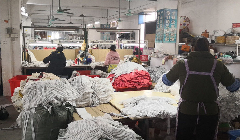 Guangzhou Beianji Clothing Co., Ltd. ligne de production du fabricant